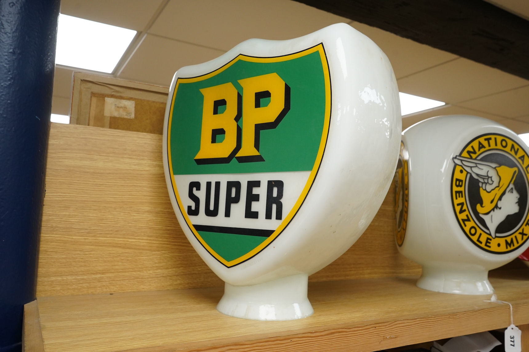 A BP Super double sided opaque glass petrol pump globe, 48cm high